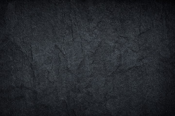 Dark grey black slate background or texture.