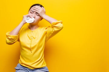 Woman use tissue paper after she sneezing