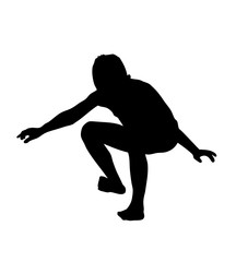 Silhouette of little a boy jumps