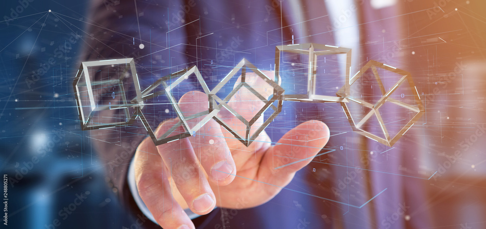 Poster businessman holding a 3d rendering blockchain cube isolated on a background