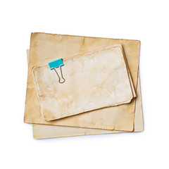 Mockup of empty old vintage yellowed paper sheets with clip