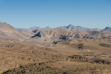 Morocco tourism: trekking man in mountains. Atlas mountains, Jebel Sakhro (Djebel Sahro), Ourzazate, Morocco