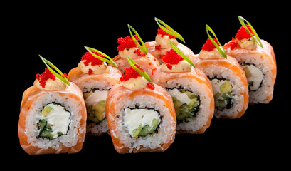 Sushi roll with salmon and Philadelphia cheese on black background