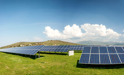 Panoramic view of solar panels, photovoltaics, alternative electricity source - concept of...