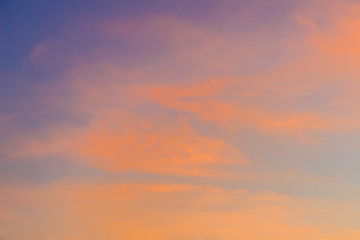  Red clouds on blue sky in twilight evening. Beautiful sunset sky with blue and red background. Dramatic colorful of dusk and dawn sky with blue sky and red clouds.