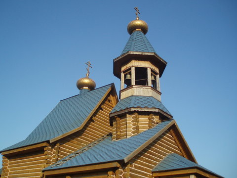 wooden Orthodox Church with bell tower