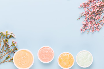 Spring greeting card, living coral color flowers on the pastel background.