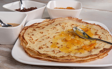 delicious pancakes with orange jam