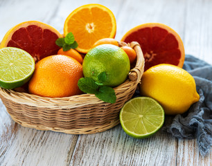 Fototapeta na wymiar Basket with citrus fresh fruits