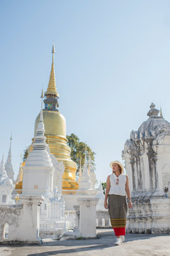 Thai traveling woman wearing wanna style traditional walking in what suan do,Chaing Mai,Thailand