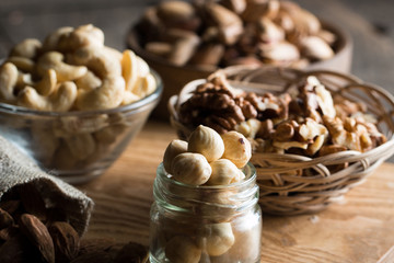mix of nuts on a wooden table