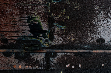 dark old paint on metal