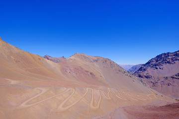 Fototapeta na wymiar Old dangerous mountain road of the Paso de la Cumbre or Cristo Redentor in the Andes between Argentina and Chile