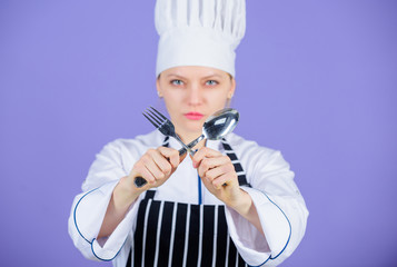 Traditional culinary. Professional cook of culinary school. Culinary arts academy. Culinary school concept. Woman professional chef hold utensil spoon and fork. Time to eat. Appetite and taste