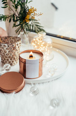 Elegant home decoration with wooden wick burning candle
