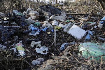 Environmental problems and nature pollution. Waste dumped in the city, an illegal social issue. Rubbish, garbage.