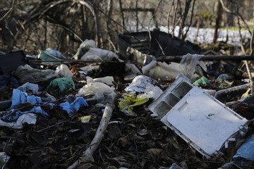 Environmental problems and nature pollution. Waste dumped in the city, an illegal social issue. Rubbish, garbage.