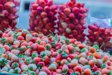 Fresh red strawberries for sale on street in Bangkok, Thailand. Street  fruit shop selling fresh...