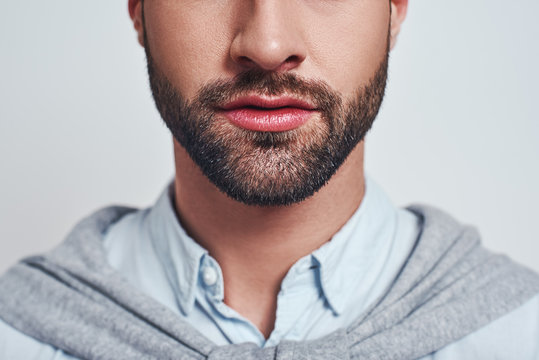 Perfect beard. Close-up cropped image of a handsome young man with a beard