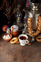 Obraz na płótnie Canvas Russian Tea Party including black tea from samovar, lump sugar, bagels sushki and baranki