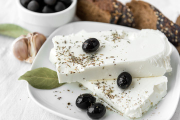 Greek feta cheese with olives, spices, garlic, bread