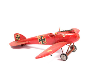 Vintage Toy Aircraft Models on White Background
