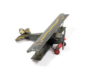 Vintage Toy Aircraft Models on White Background