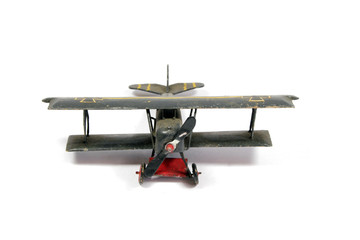 Vintage Toy Aircraft Models on White Background