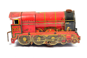 Vintage Red Used Wind Up Toy Train on White Background