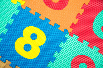 Colorful Baby Mat. Rubber foam pad for children playing. Colorful background ackground with digits