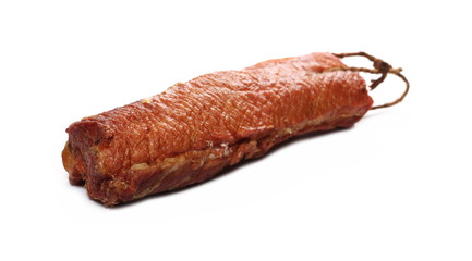 Traditional cured, smoked meat isolated on white background