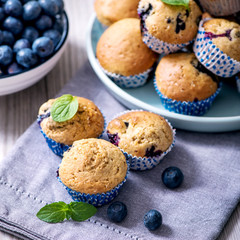Muffins with blueberries, healthy homemade fresh baked muffins and berries, square image