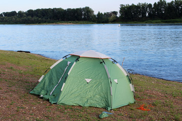 The Camping Tent near river in the summer