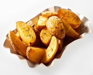 Roasted potato wedges in their jackets