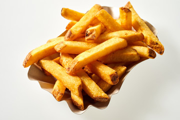 Fried potato chips, French fries or Pommes Frites