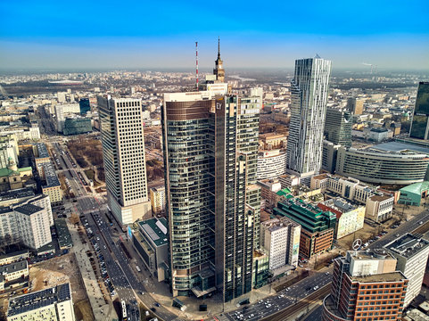 WARSAW, POLAND - FEBRUARY 10, 2019: Beautiful panoramic aerial drone view to panorama cityscape of Warsaw modern City, PKiN and "Rondo 1" office skyscraper located at Rondo ONZ