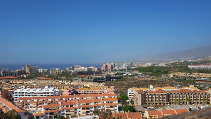 Fototapeta na wymiar Elevated views of the vast Las Americas resort from Montaña Chayofita expanded over two municipalities once known as fishing villages, Las Americas, Tenerife, Canary Islands, Spain