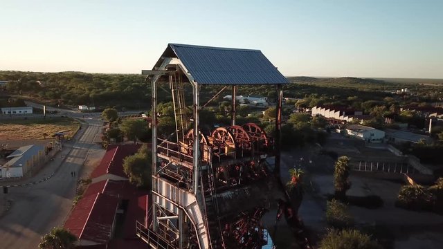 Beautiful old rusty mine shaft in the middle of an old mining town in Namibia called Tsumeb.