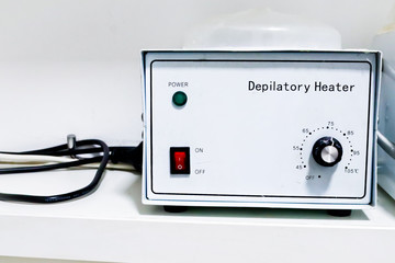 isolated depilatory heater for hair removal in beauty salon