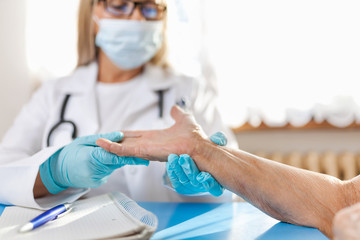 Senior woman during a medical exam with practitioner