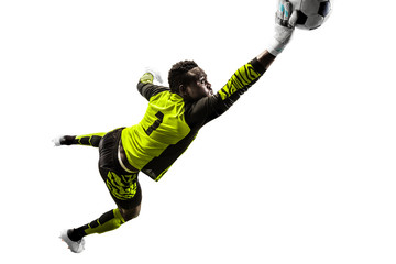 Male soccer player goalkeeper catching ball in jump. Silhouette of fit man with ball isolated on white studio background © master1305