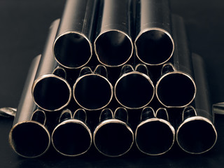 metal chrome pipes on a black background
