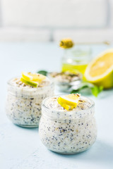 Healthy breakfast, lemon poppy seed overnight oats. Selective focus, space for text.