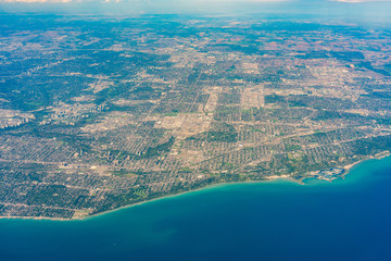 Fototapeta na wymiar Aerial view of the Toronto area cityscape with Bluffer's Park Marina