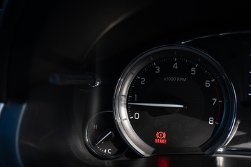 car dashboard and any symbol for alert.