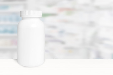 Medicine container on a chemist counter desk against a white background. Mock up and empty copy space for Editor's text.
