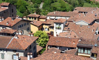 Fototapeta na wymiar The roofs of Bergamo. View from the Campanone tower.