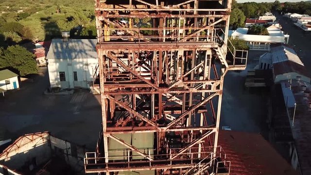 Beautiful old rusty mine shaft in the middle of an old mining town in Namibia called Tsumeb.