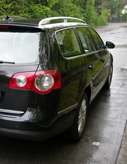 Naklejka premium Italy: Broadside of Black car.