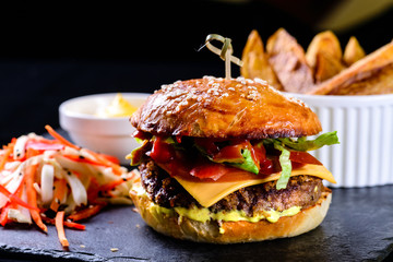 homemade burger, salad and potatoes - fast food set